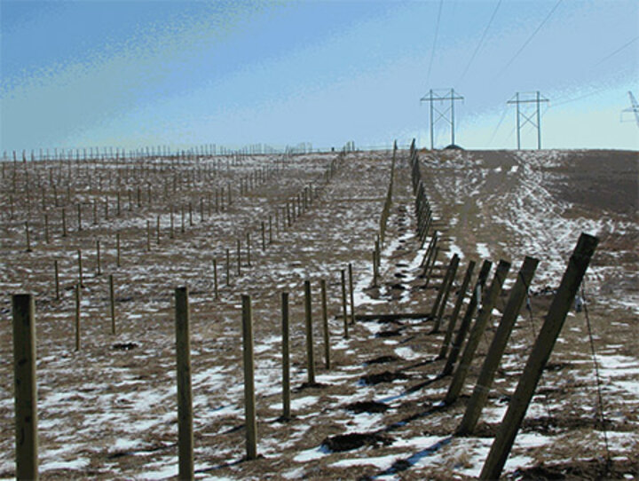 End post installed at a 15-degree angle with a "dead man" anchor.